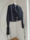Short jacket with tied sleeves black La Milla Short jacket with tied sleeves black La Milla